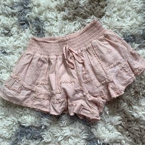 pink short ruffled shorts